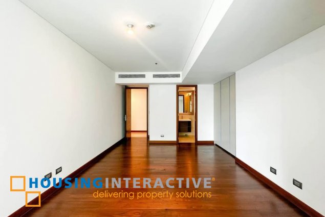 semi-furnished 3br unit with parking for sale in two roxas triangle