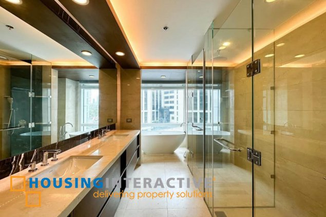 semi-furnished 3br unit with parking for sale in two roxas triangle