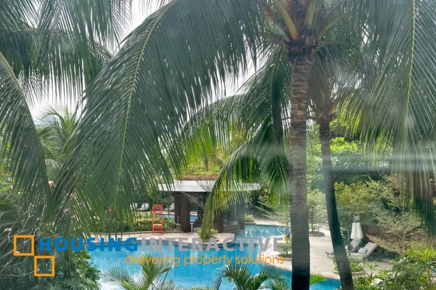 semi-furnished 3br unit with parking for sale in two roxas triangle