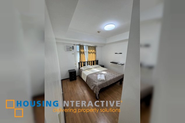 fully furnished 2br unit with balcony and parking for lease in two serendra