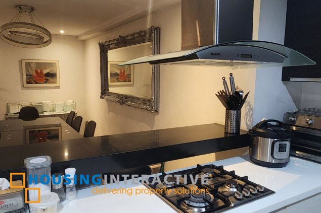 furnished 3br unit with parking for sale in garden island condoville