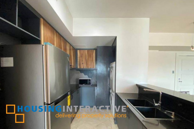 fully furnished 1br unit with parking for lease in the manansala