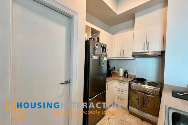 furnished 2br unit with parking for sale in the manansala