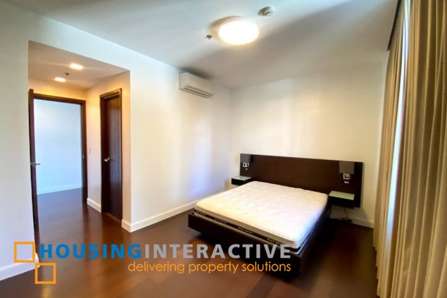 semi-furnished 2br unit with parking for sale in the suites
