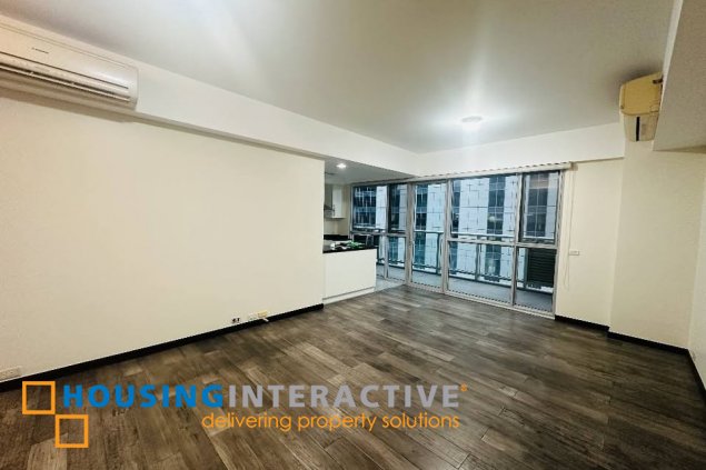 bare 2br unit with parking for sale in one serendra