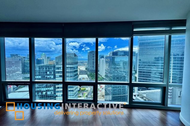 semi-furnished 2br unit with balcony and parking for lease in the suites