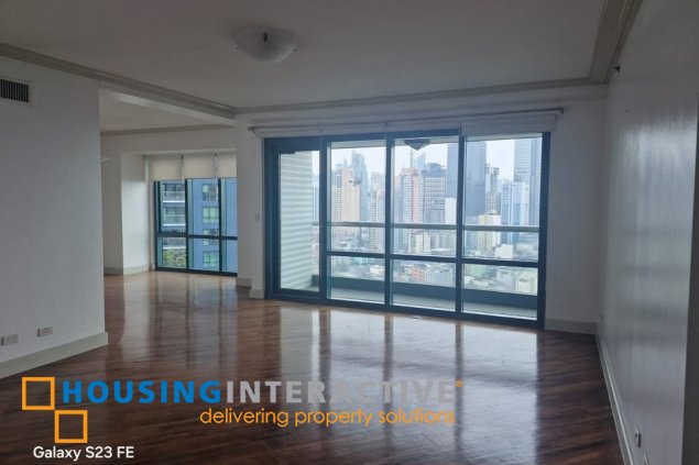 bare 2br unit with balcony and parking for sale in amorsolo east