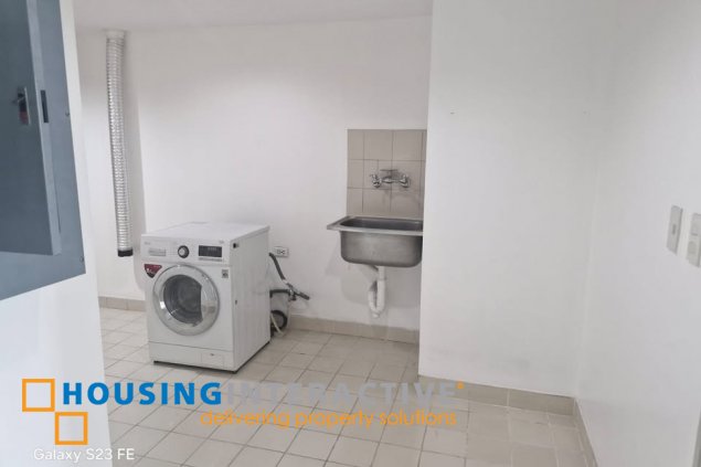 bare 2br unit with balcony and parking for sale in amorsolo east