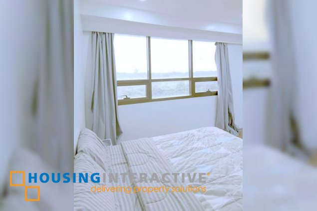 semi-furnished 2br unit with parking for sale in icon residences
