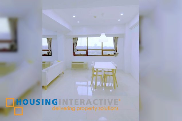 semi-furnished 2br unit with parking for sale in icon residences