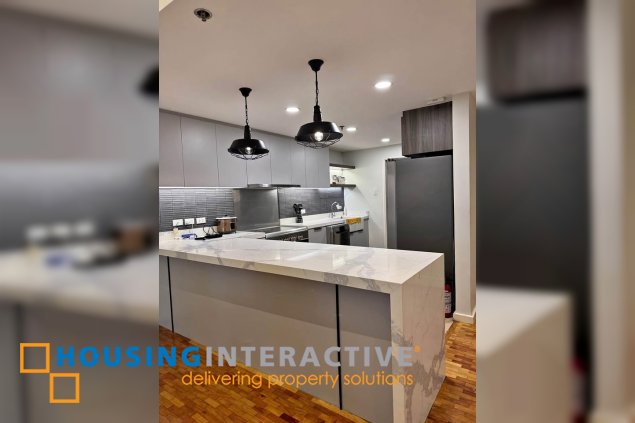for rent: spacious 2-bedroom condo in le triomphe