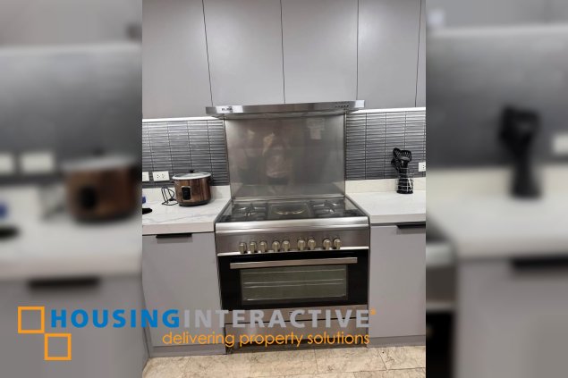 for rent: spacious 2-bedroom condo in le triomphe