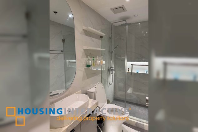 for rent: spacious 2-bedroom condo in le triomphe