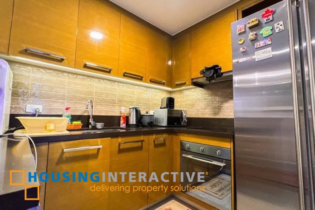 semi-furnsihed 2br unit with parking for sale in proscenium at rockwell