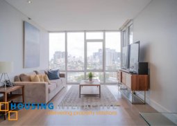 furnished 2br unit with balcony and parking for lease in proscenium at rockwell