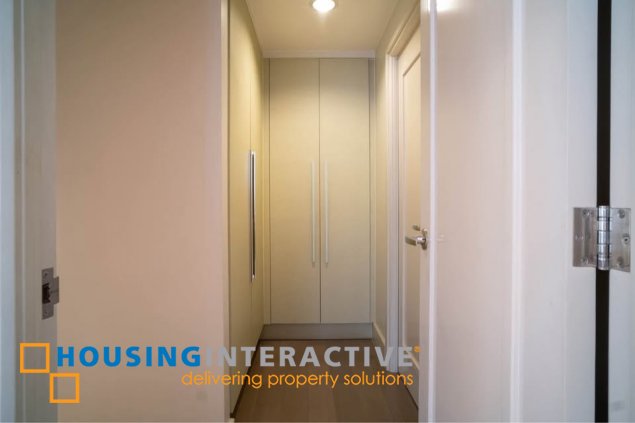 furnished 2br unit with balcony and parking for lease in proscenium at rockwell