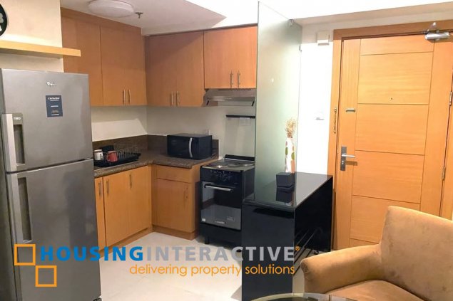 fully furnished 1br unit for sale in the trion towers