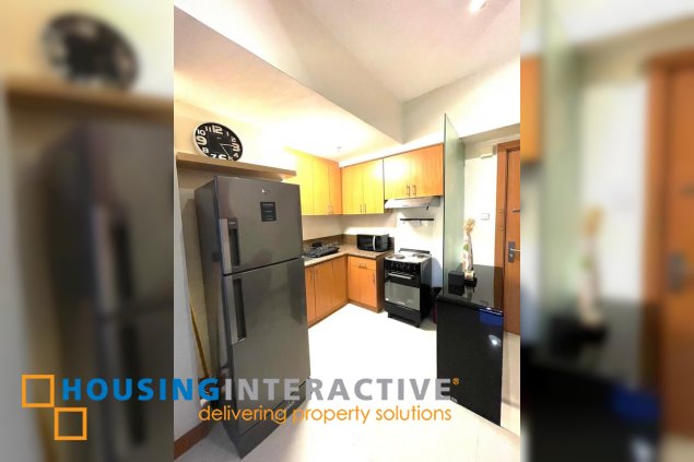 fully furnished 1br unit for sale in the trion towers