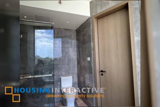 bare 3br unit with parking for sale in aurelia residences