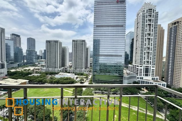 furnished 2br unit with balcony and parking for sale in trion towers