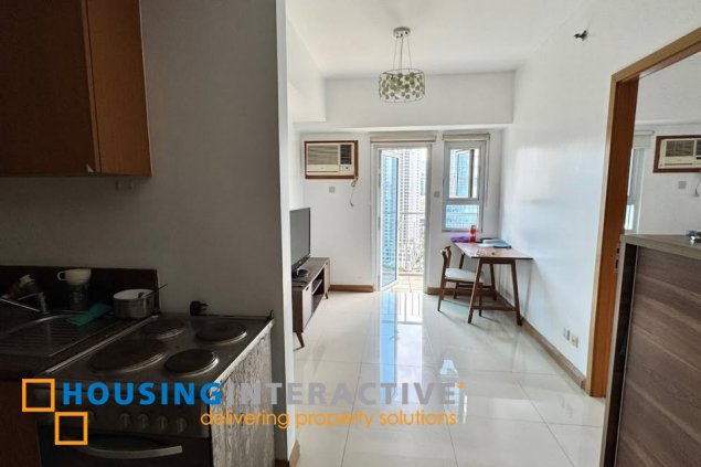 furnished 2br unit with balcony and parking for sale in trion towers