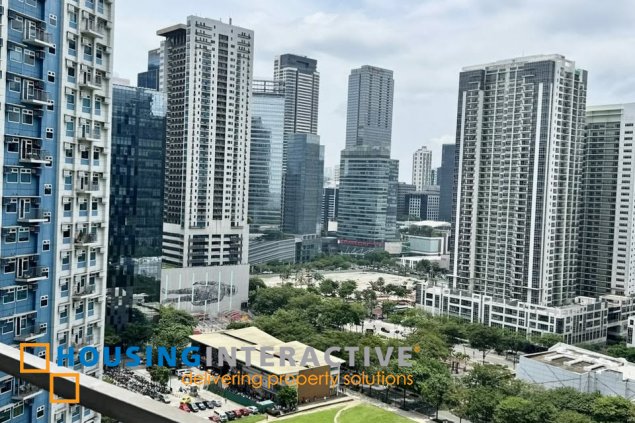 furnished 2br unit with balcony and parking for sale in trion towers