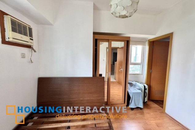 furnished 2br unit with balcony and parking for sale in trion towers