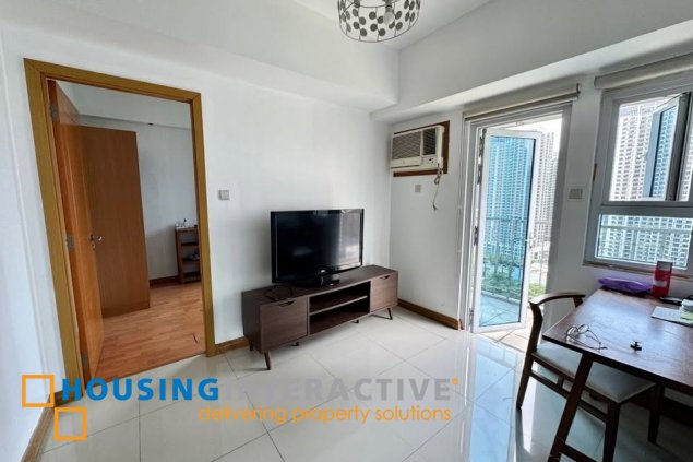 furnished 2br unit with balcony and parking for sale in trion towers