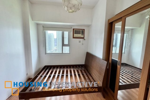 furnished 2br unit with balcony and parking for sale in trion towers
