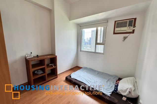 furnished 2br unit with balcony and parking for sale in trion towers