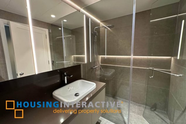 bare 3br unit with parking for sale in one roxas triangle