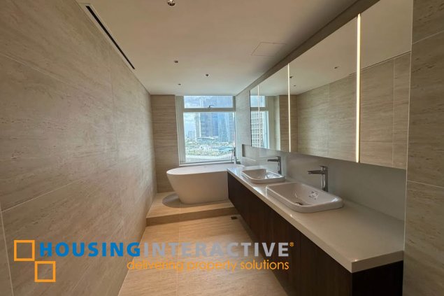 bare 3br unit with parking for sale in one roxas triangle