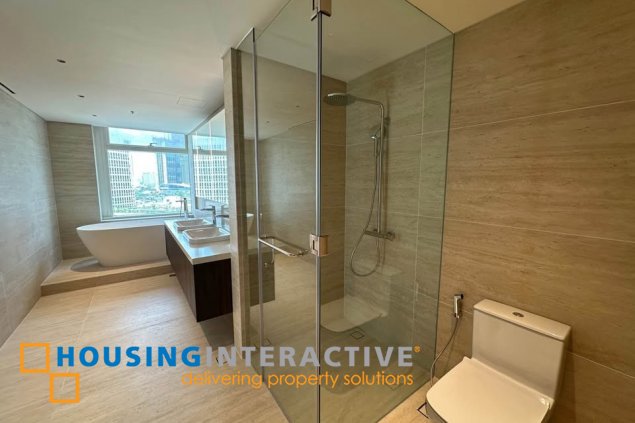 bare 3br unit with parking for sale in one roxas triangle