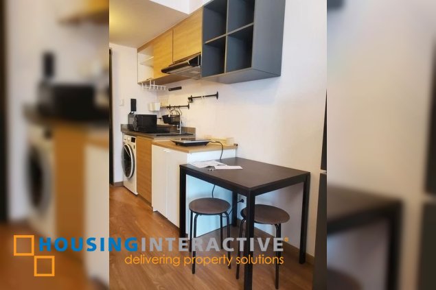 furnished 1br unit for sale in the rise
