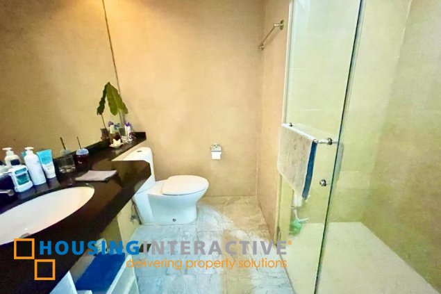 fully furnished 2br unit with balcony and parking for sale in one serendra