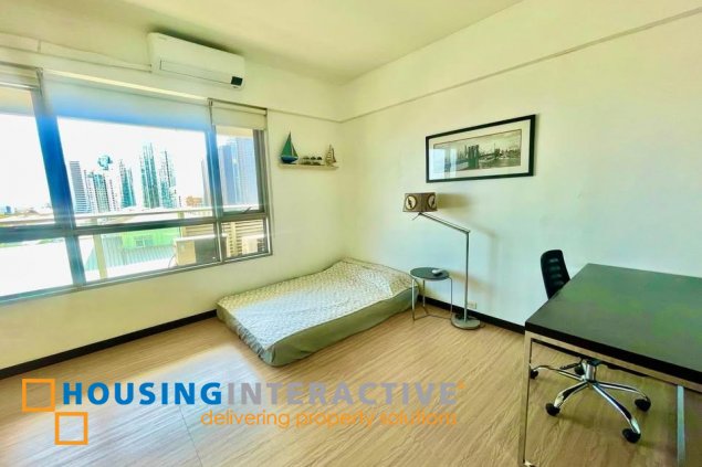 fully furnished 2br unit with balcony and parking for sale in one serendra
