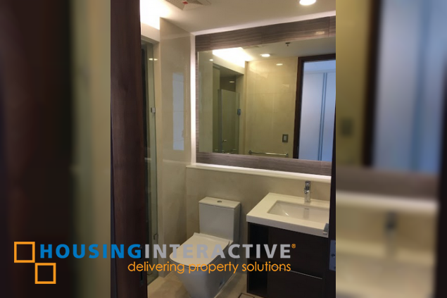 semi-furnished 3br unit with parking for lease in two roxas triangle