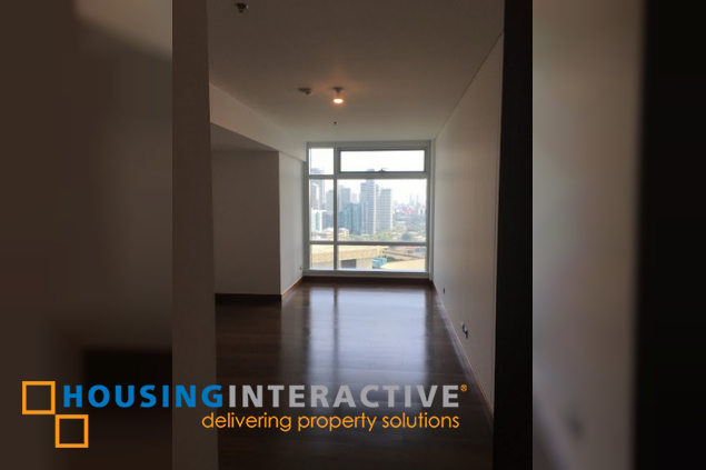 semi-furnished 3br unit with parking for lease in two roxas triangle