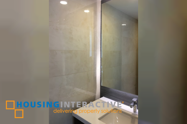 semi-furnished 3br unit with parking for lease in two roxas triangle