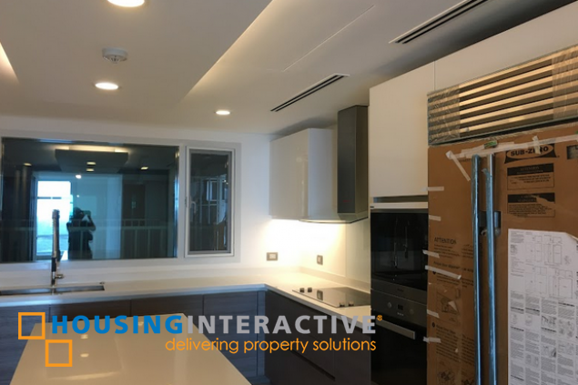 semi-furnished 3br unit with parking for lease in two roxas triangle