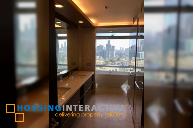 semi-furnished 3br unit with parking for lease in two roxas triangle