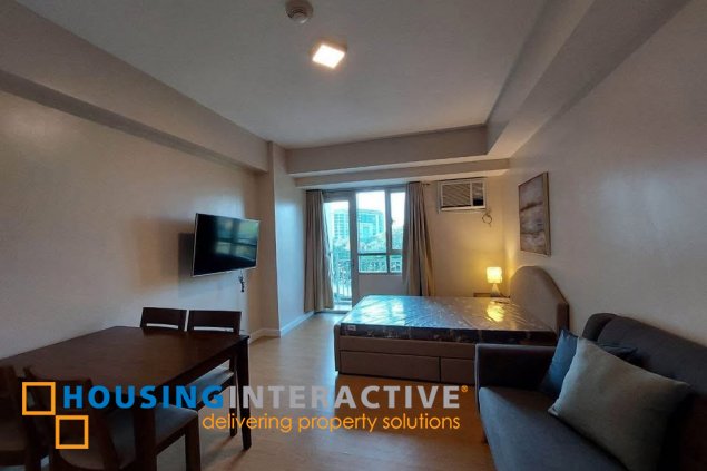 fully furnished studio unit with parking for sale in the grove by rockwell