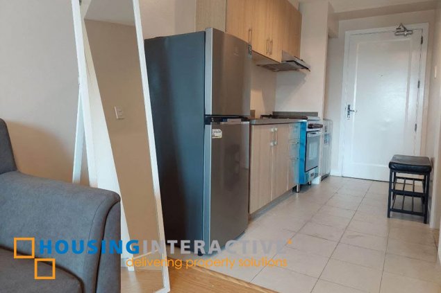 fully furnished studio unit with parking for sale in the grove by rockwell