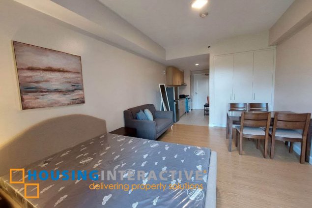 fully furnished studio unit with parking for sale in the grove by rockwell