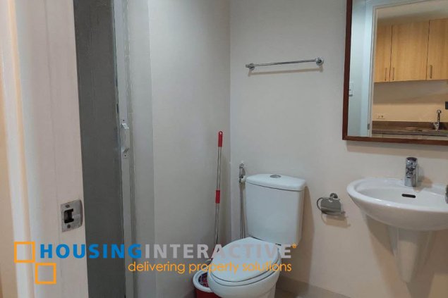 fully furnished studio unit with parking for sale in the grove by rockwell