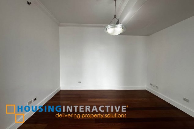 semi-furnished 3br unit with parking for lease in one roxas triangle