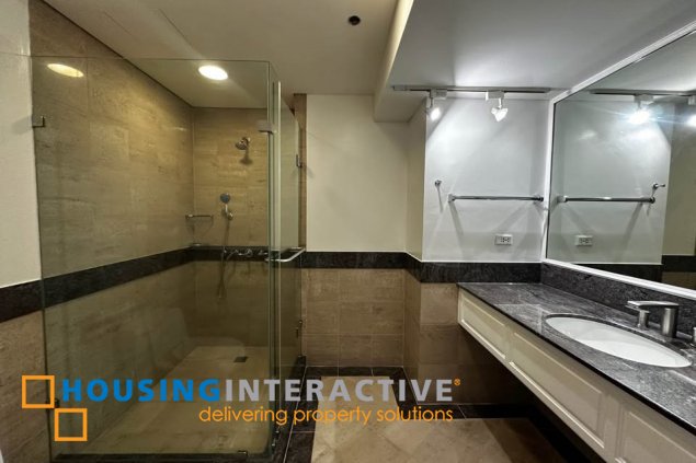 semi-furnished 3br unit with parking for lease in one roxas triangle