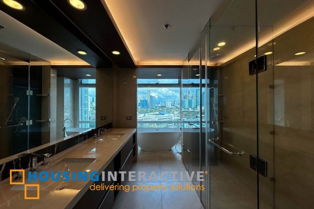 semi-furnished 3br unit with parkings for lease in two roxas triangle