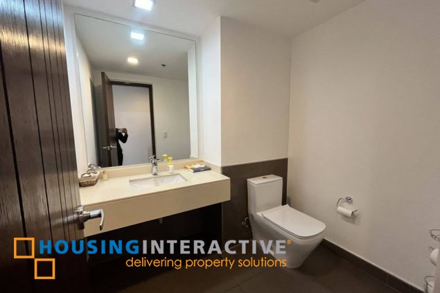 fully furnished 2br unit with 2 parking slots for rent in the suites