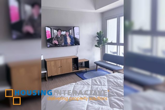 fully furnished studio unit with balcony for lease in uptown arts residence